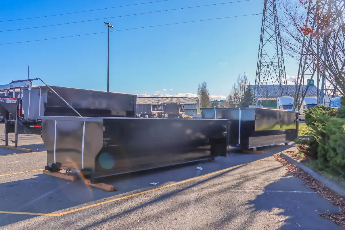 Roll-off dumpster ready for waste disposal at job site for 2 Yard Dumpster Rental in Cape Girardeau